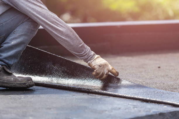 Professional Basement Waterproofing technician working in Ortonville, MN